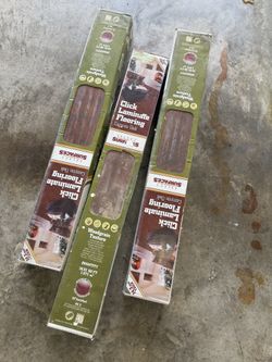 3 new packs of wood flooring