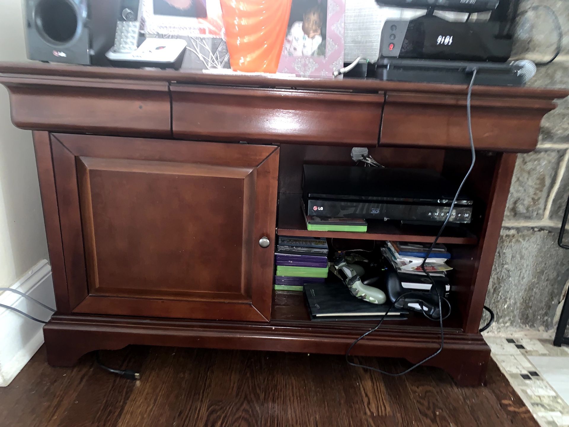 TV stand for sale - solid wood! Dark cherry color - 42” W x 26-1/2” H
