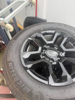 OEM Chevy Silverado 18” rims and michelin primacy tires