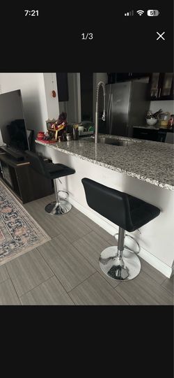 Black leather bar stools