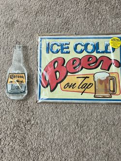 Metal beer sign and corona bottle clock