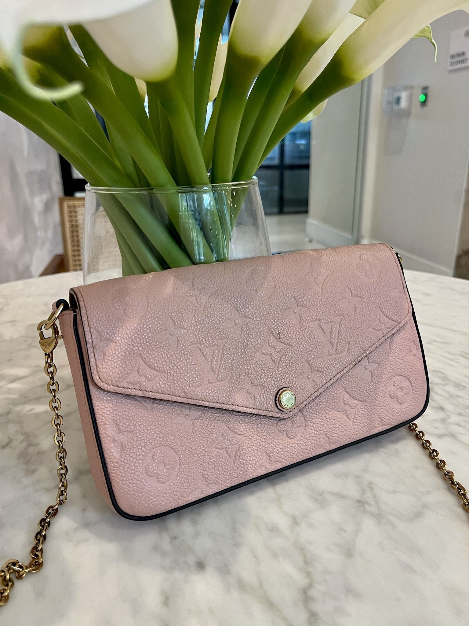 Louis Vuitton Fรฉlicie Pochette in Monogram Empreinte leather (Rose Poudre/Pink)