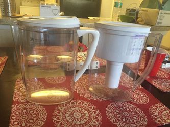 2 water filter pitchers Brita