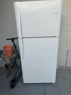 Full size White Refrigerator For Sale  Call or Text (contact info removed)