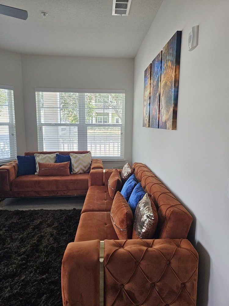 Orange Suede Sofa and Loveseat