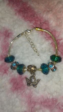 Blue Stationary Angel Charm Bracelet