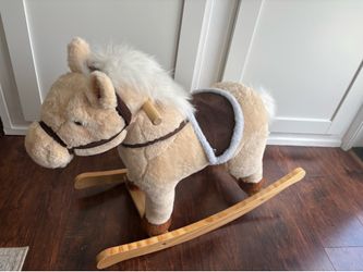 Kids ride on rocking horse