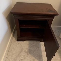 Dark bedside table