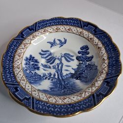 Blue and White Porcelain Plate with Scenic Design and Gold Trim