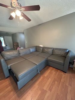 Large Gray Faux Leather Sectional Sofa