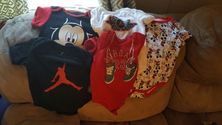 3 Jordan and 2 mickey mouse onesies 3/6 & 6/9 months ALL NEW