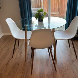 Glass Table And 4 Chairs 
