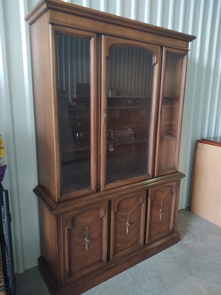 Hutch with wooden shelves silverware drawer and plenty of storage