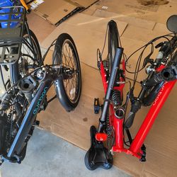 Pair of Near New Folding Bikes with Bags & Extras