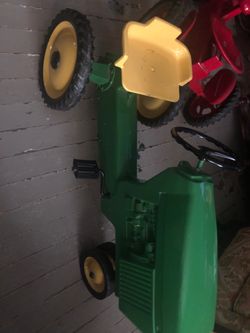 Metal green antique tractor