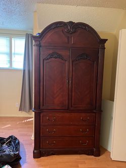 Wooden Armoire with a built-in dresser