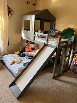 Bunk bed with slide. Gray. Full size on the bottom with a twin on top