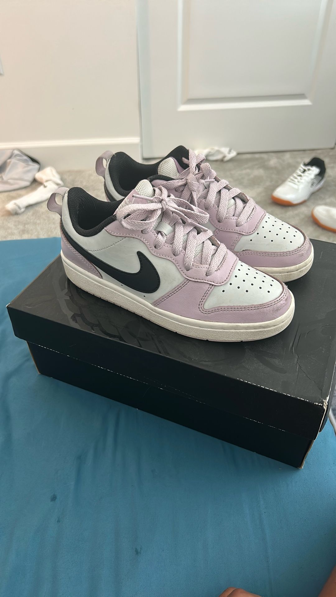 magenta/black jordan 1 lows women’s