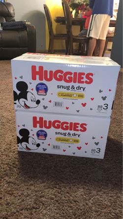 2 boxes of Huggies size 3