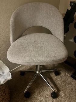 Gray chair with wheels