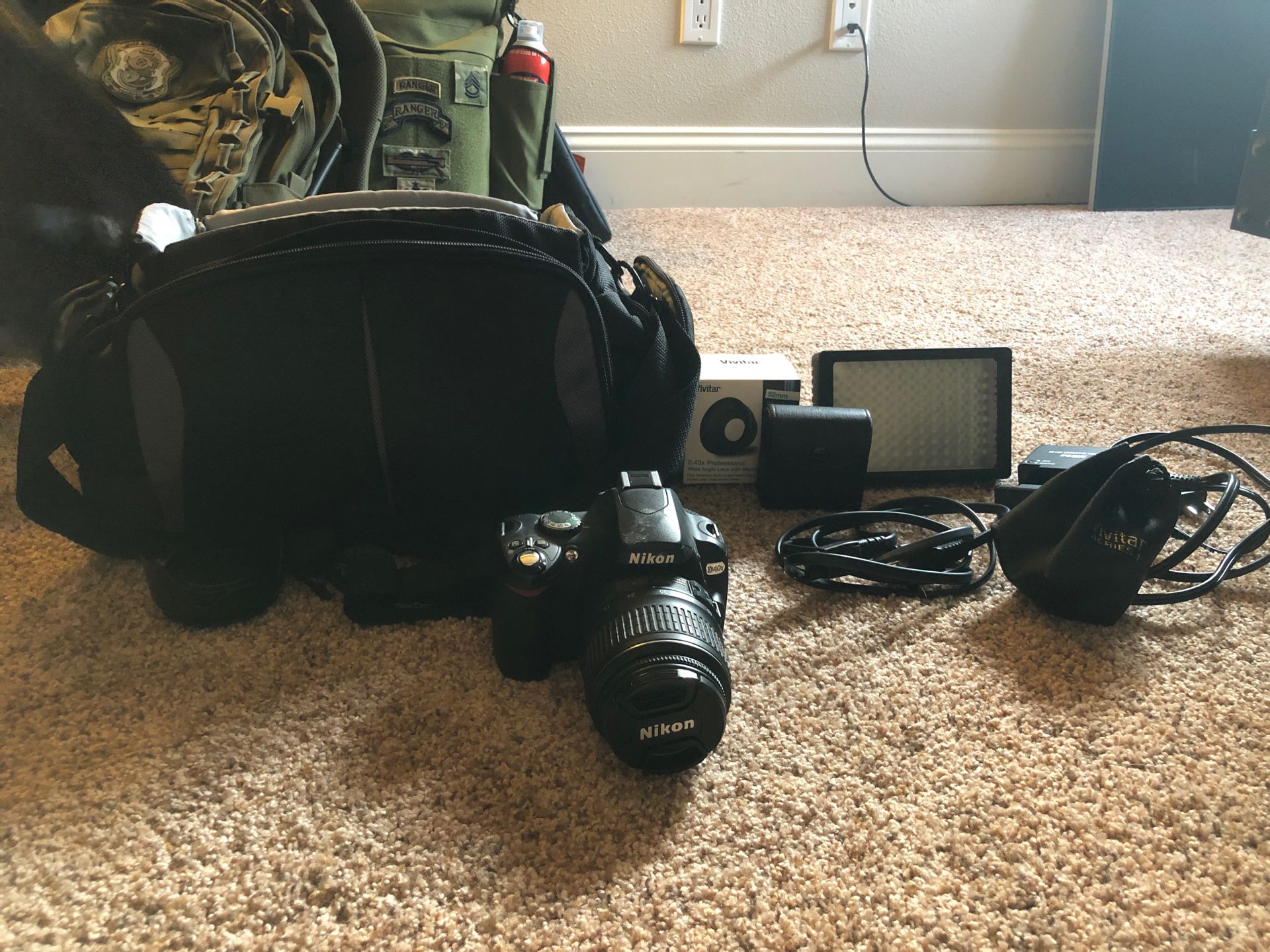 Nikon d40x camera with accessories, extra lenses, and carrying case