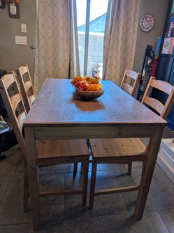 Ikea Jokkmokk solid pine table and 4 chairs