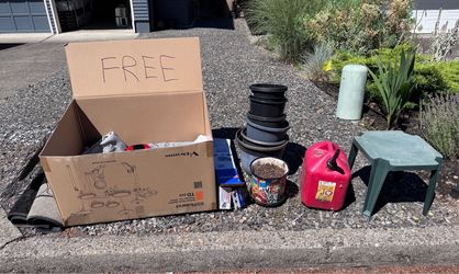 FREE PILE - Door mats, planters, housewares, garden items, gas can, light fixture, shower caddy, curtain