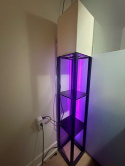 Shelf with lamp on top