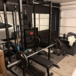 Squat Rack With Multi Function Attachment Areas. 