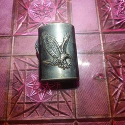 Vintage Silver Toned Zippo Lighter With An 🦅 Eagle Design For Sale.