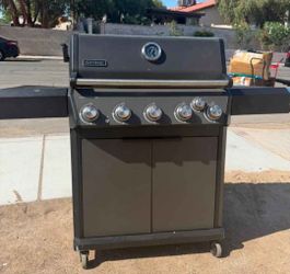 New propane grill with side burner