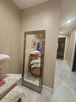 Very heavy stand up full length mirror.