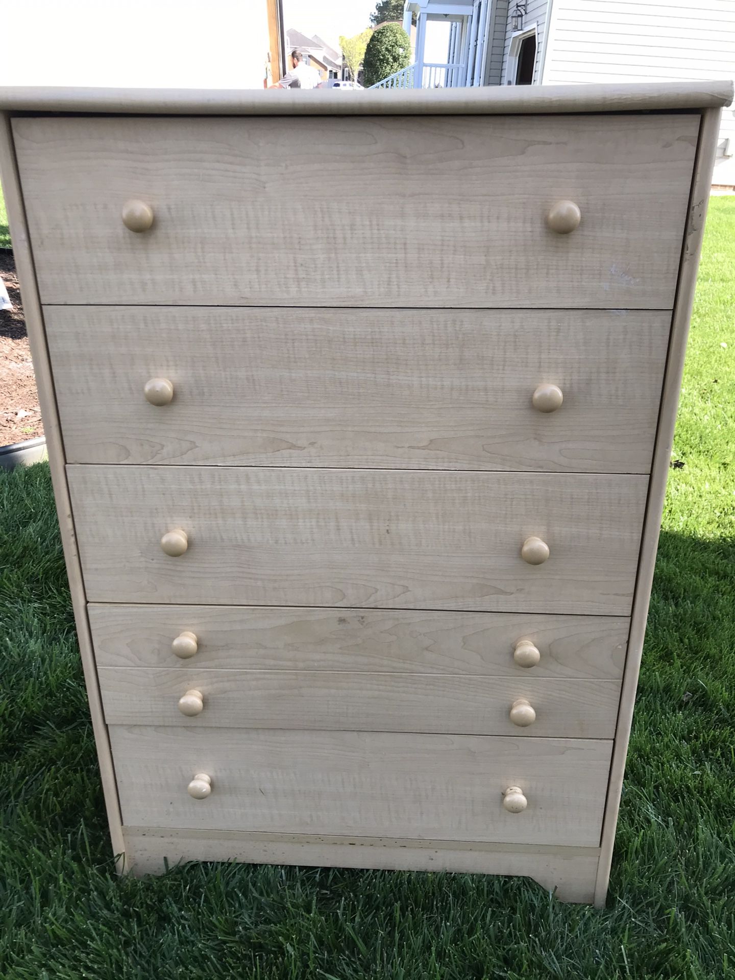 Tan dresser with five drawers