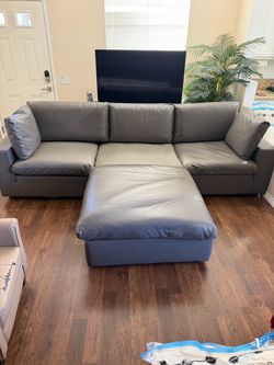 Gray Faux/Vegan Leather Sectional Sofa with Ottoman