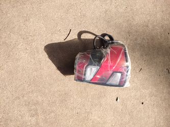 16-21 NISSAN TITAN DRIVER SIDE TAIL LIGHT