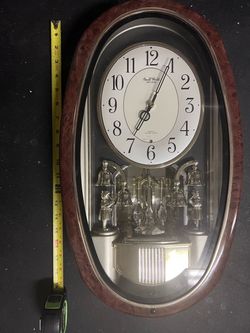 Rhythm Small World Quartz Melody Chime Wall Clock