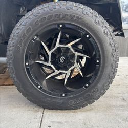 set of 4 wheel and tires 20x12 on 35