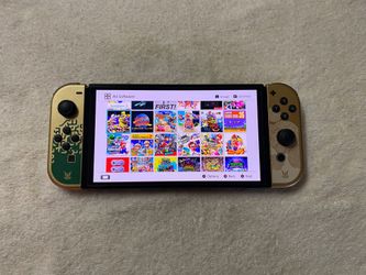 Nintendo Switch OLED + 100 POPULAR SWITCH GAMES