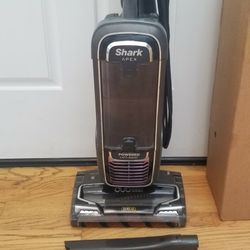 NEW cond  SHARK.  APEX MODEL ,  LIFT-AWAY MODEL VACUUM  , WITH ATTACHMENTS  , AMAZING POWER SUCTION. , WORKS EXCELLENT. , IN THE BOX 