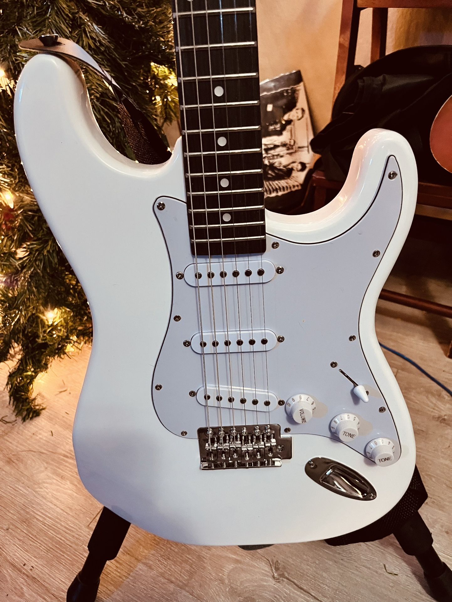 “Off-Brand” White Electric Guitar 