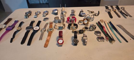 32 watches $5 and $10 each or all for $200