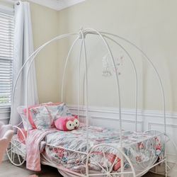 Whimsical Metal Twin Carriage Bed