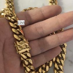 New 18k Yellow Gold Cuban Link Chain And Bracelet 