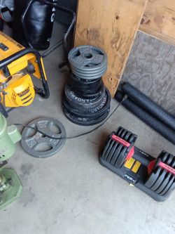 Weight ATherend Bench There Is 225 Lb Of Cast Iron Weights One Curling Bar Power Lift Bar One Dumbbell 52 Lb One Punching Bag And Two Overhead Light P