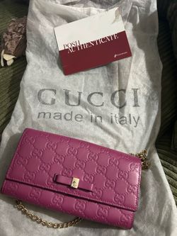Genuine gucci purse with authenticity slip and gucci grey slip bag to hold it