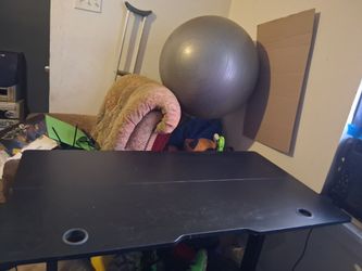 Black Gaming Desk, With a PC, Monitor, and Wires.