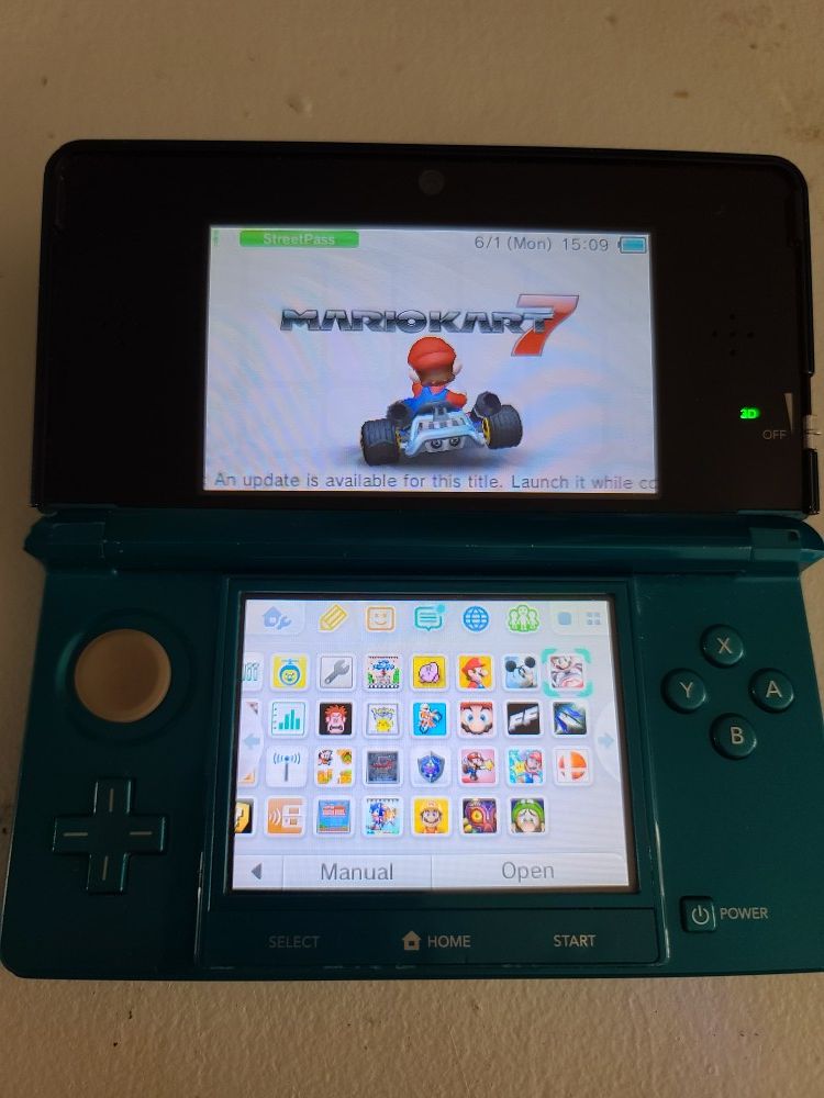 Nintendo 3ds with charger and 22 games