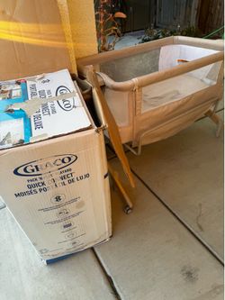 Baby bassinet and pack and play