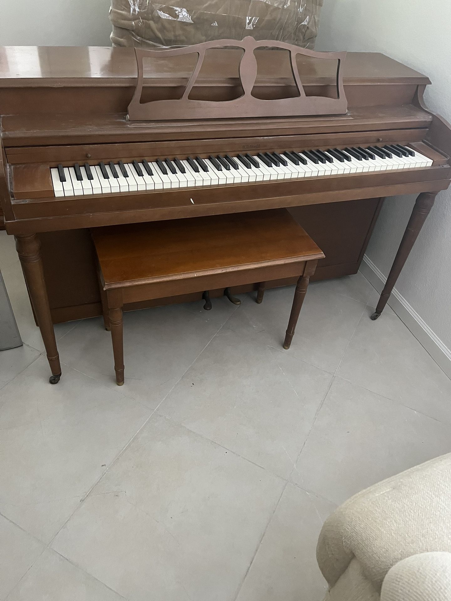 Piano with matching chair