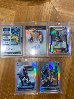 Football sports cards downtown auto nix puka Lamar Jackson njigba rams kupp
